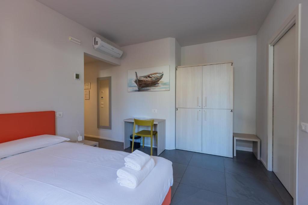 Postel nebo postele na pokoji v ubytování StraVagante Hostel & Rooms