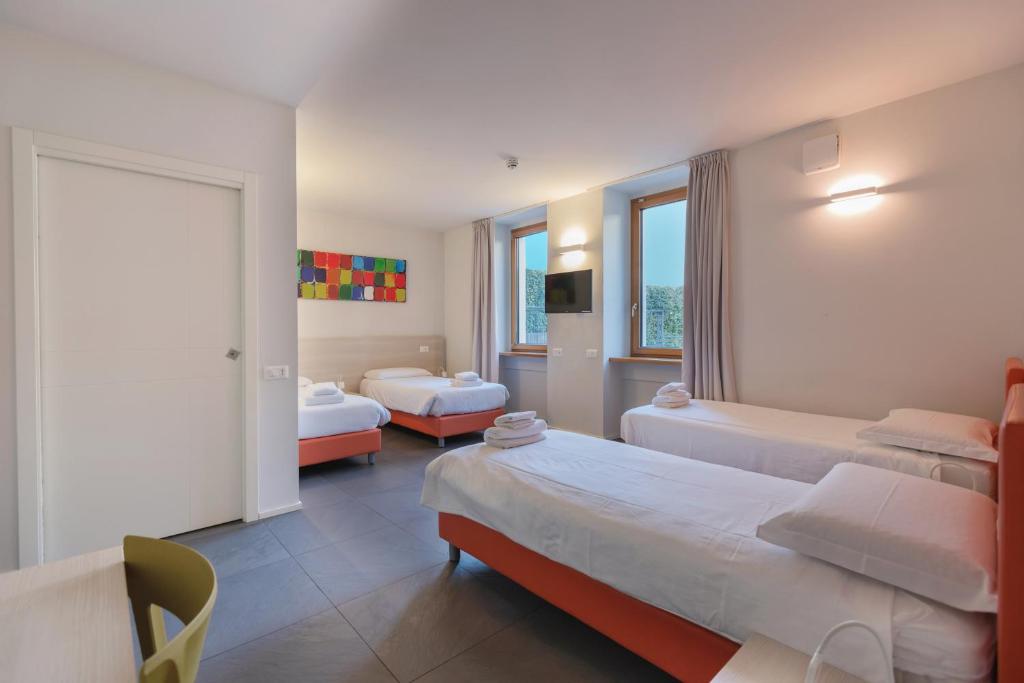 Postel nebo postele na pokoji v ubytování StraVagante Hostel & Rooms