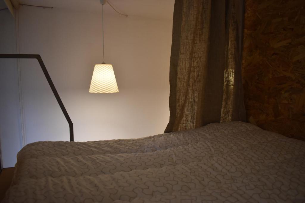Postel nebo postele na pokoji v ubytování SLEEP STUDIO Hostel