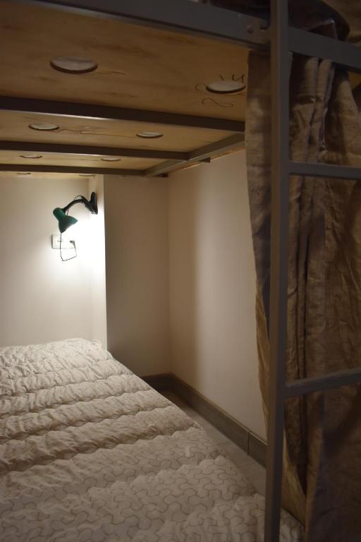 Postel nebo postele na pokoji v ubytování SLEEP STUDIO Hostel