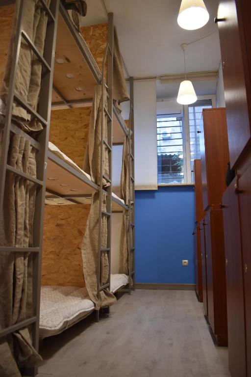 Postel nebo postele na pokoji v ubytování SLEEP STUDIO Hostel