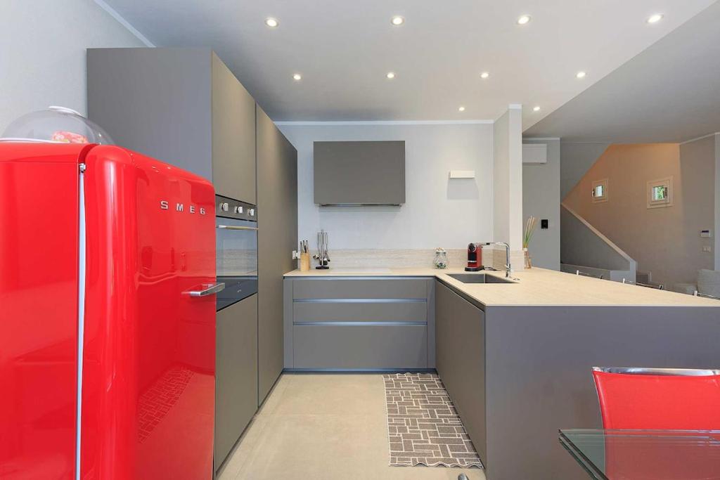 A kitchen or kitchenette at Pretty home in a resort with pool! - Casa Aurora