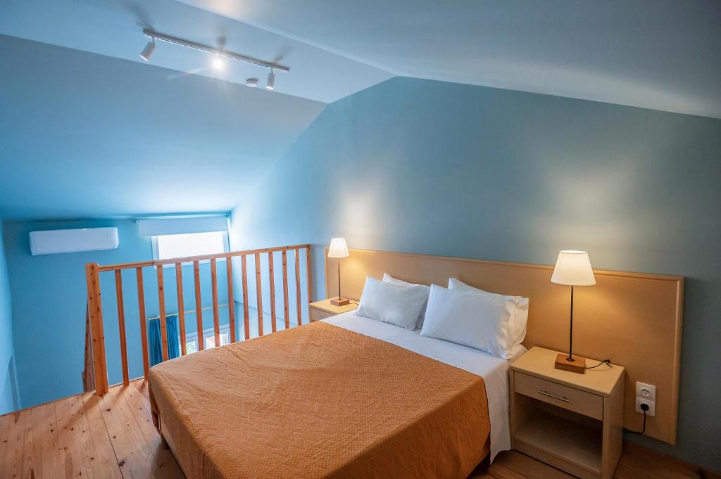 Postel nebo postele na pokoji v ubytování Hotel Coral