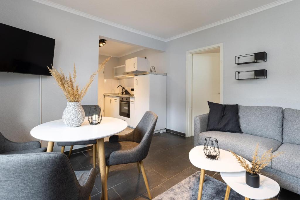 Kuchyň nebo kuchyňský kout v ubytování Appartement Merle Kieler Straße 16a APPARTO Grömitz