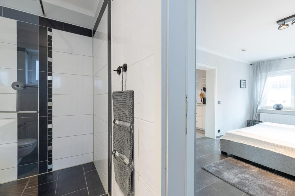 Postel nebo postele na pokoji v ubytování Appartement Merle Kieler Straße 16a APPARTO Grömitz