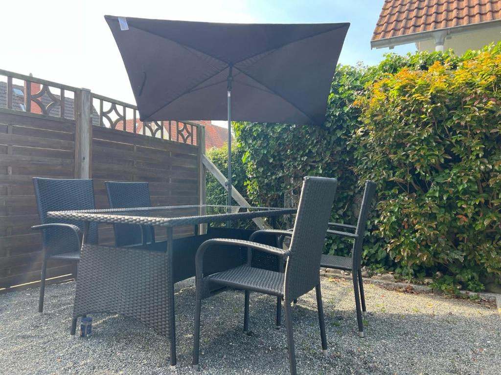Patio nebo venkovní prostory v ubytování Appartement Merle Kieler Straße 16a APPARTO Grömitz