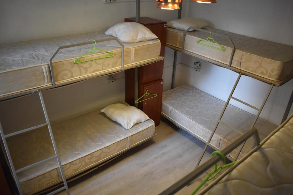 Postel nebo postele na pokoji v ubytování SLEEP STUDIO Hostel