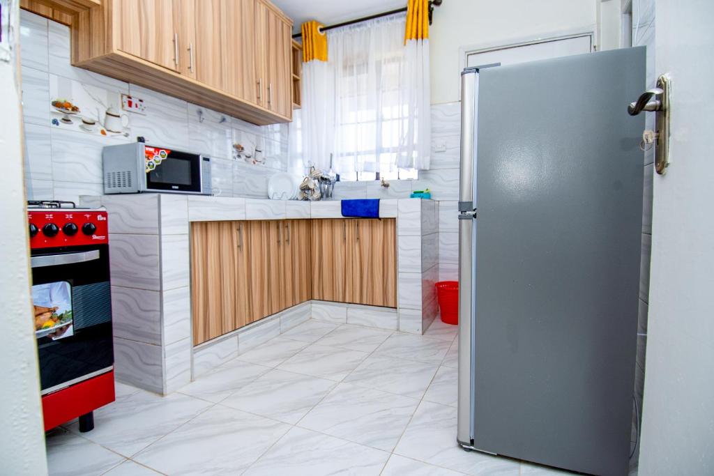 Kuchyň nebo kuchyňský kout v ubytování Blink comfort suite- Rhino
