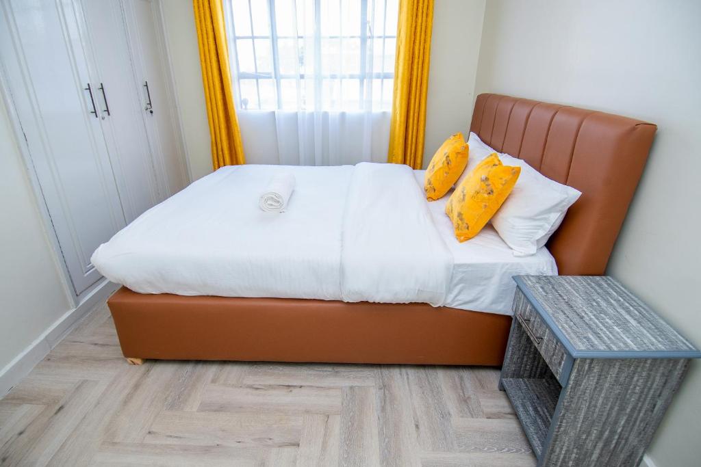 Postel nebo postele na pokoji v ubytování Blink comfort suite- Rhino