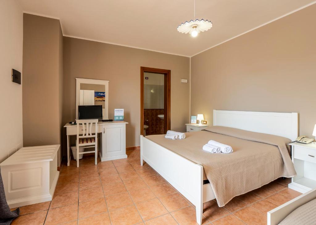 Postel nebo postele na pokoji v ubytování Leuca Relais - Seaside Retreat