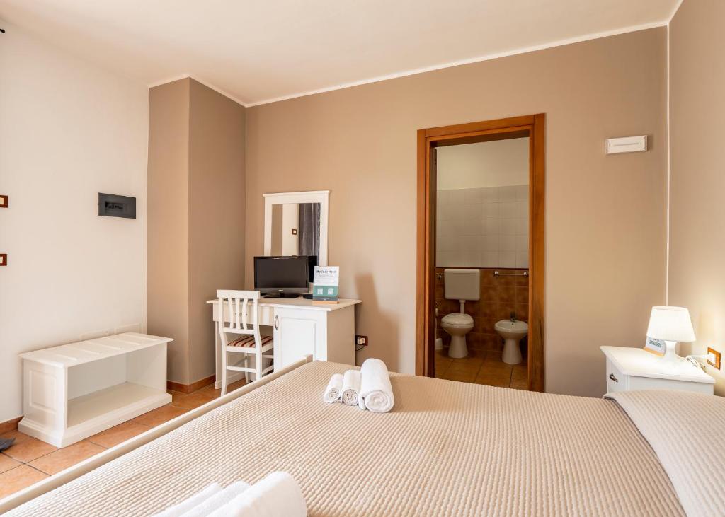 TV a/nebo společenská místnost v ubytování Leuca Relais - Seaside Retreat
