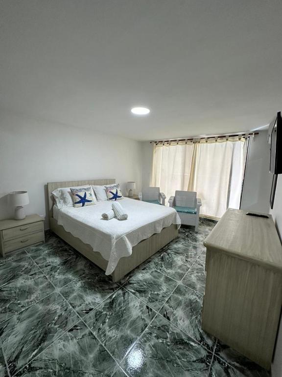 Postel nebo postele na pokoji v ubytování Apartamentos Top Hansa Alfrente de la playa