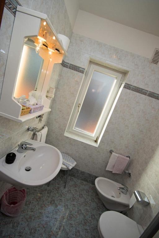 Koupelna v ubytování Hotel Miravalle