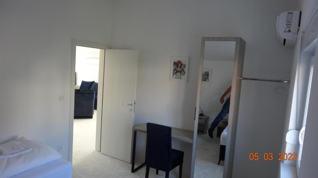 Postel nebo postele na pokoji v ubytování Meerblick & Pool