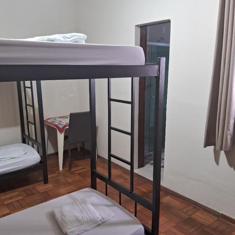 Postel nebo postele na pokoji v ubytování Hostel Casa Mineira