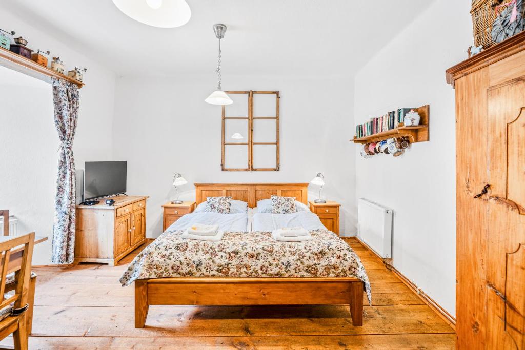 Postel nebo postele na pokoji v ubytování Apartmány Krumlov