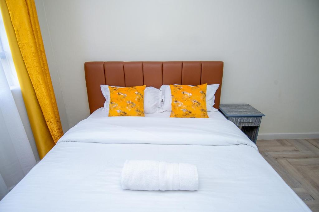 Postel nebo postele na pokoji v ubytování Blink comfort suite- Tiger