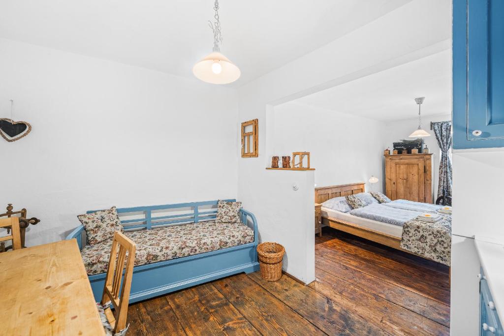 Postel nebo postele na pokoji v ubytování Apartmány Krumlov