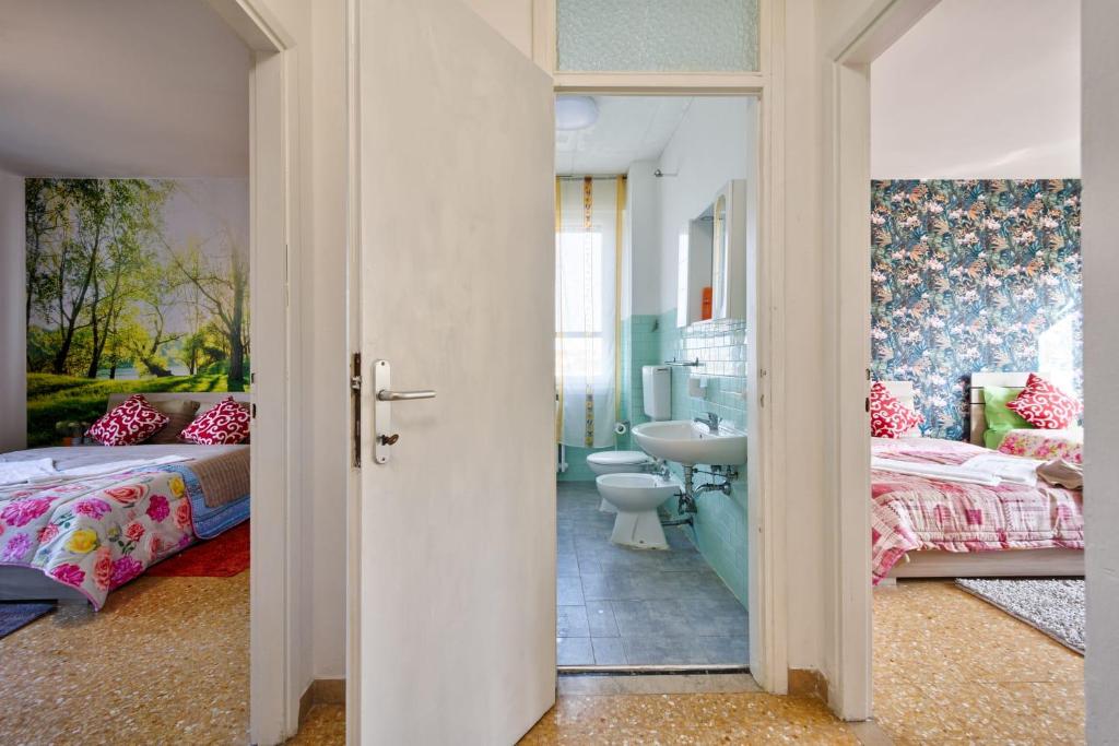 Postel nebo postele na pokoji v ubytování R & R Apartment