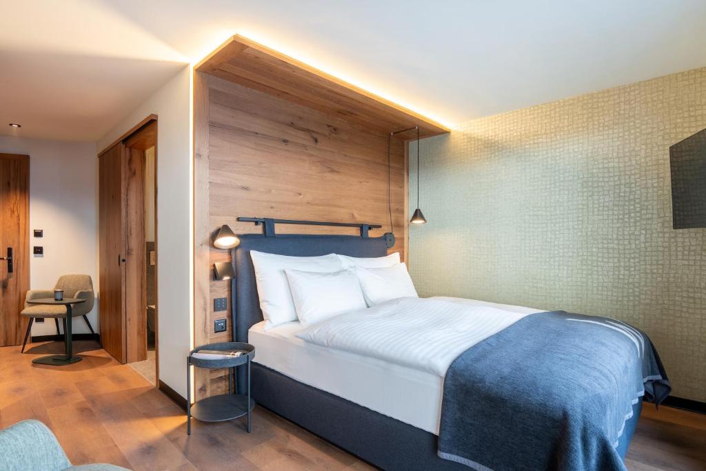 Postel nebo postele na pokoji v ubytování Welschen Hotel