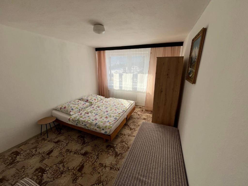 Postel nebo postele na pokoji v ubytování U Milušky