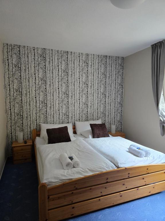 Postel nebo postele na pokoji v ubytování Hotel Zur Luppbode