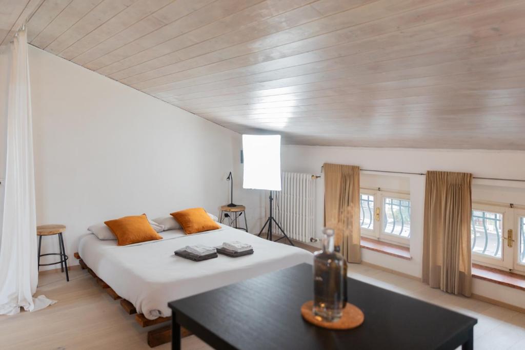 A bed or beds in a room at CA11 - Apartments