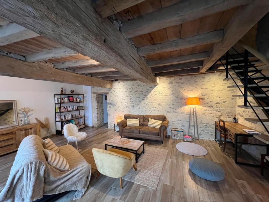 Χώρος καθιστικού στο A 9 min du "Puy duFou" grande maison à la ferme