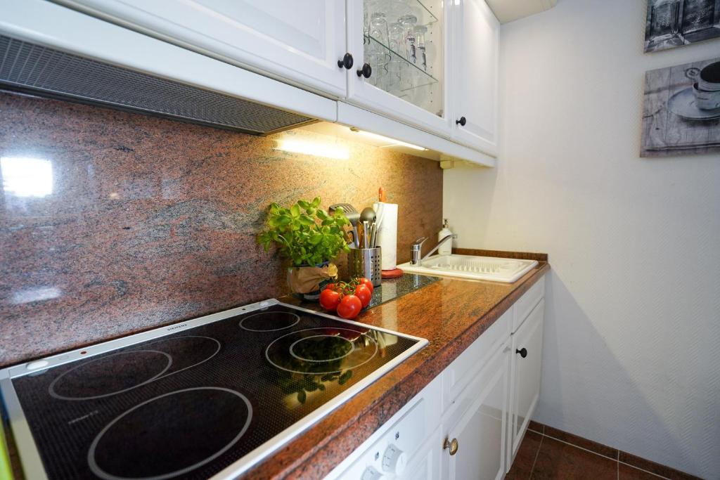 Kuchyň nebo kuchyňský kout v ubytování Grömitz-Center I Whg 314