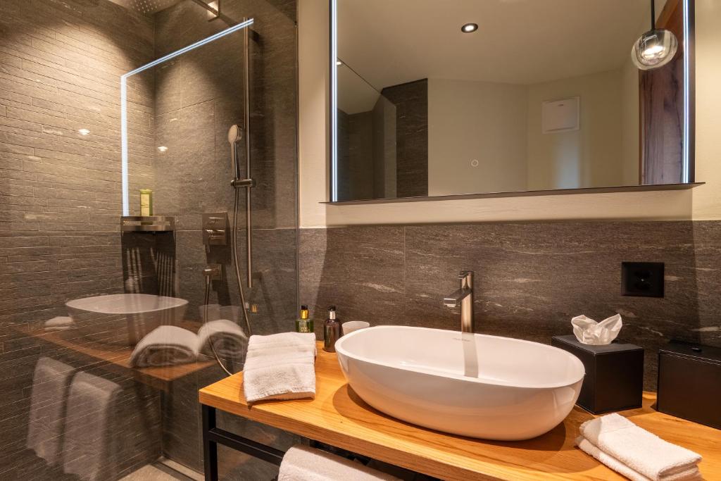 Koupelna v ubytování Welschen Hotel