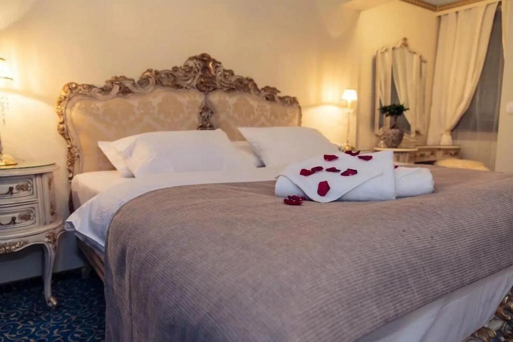 Postel nebo postele na pokoji v ubytování Hotel Stern