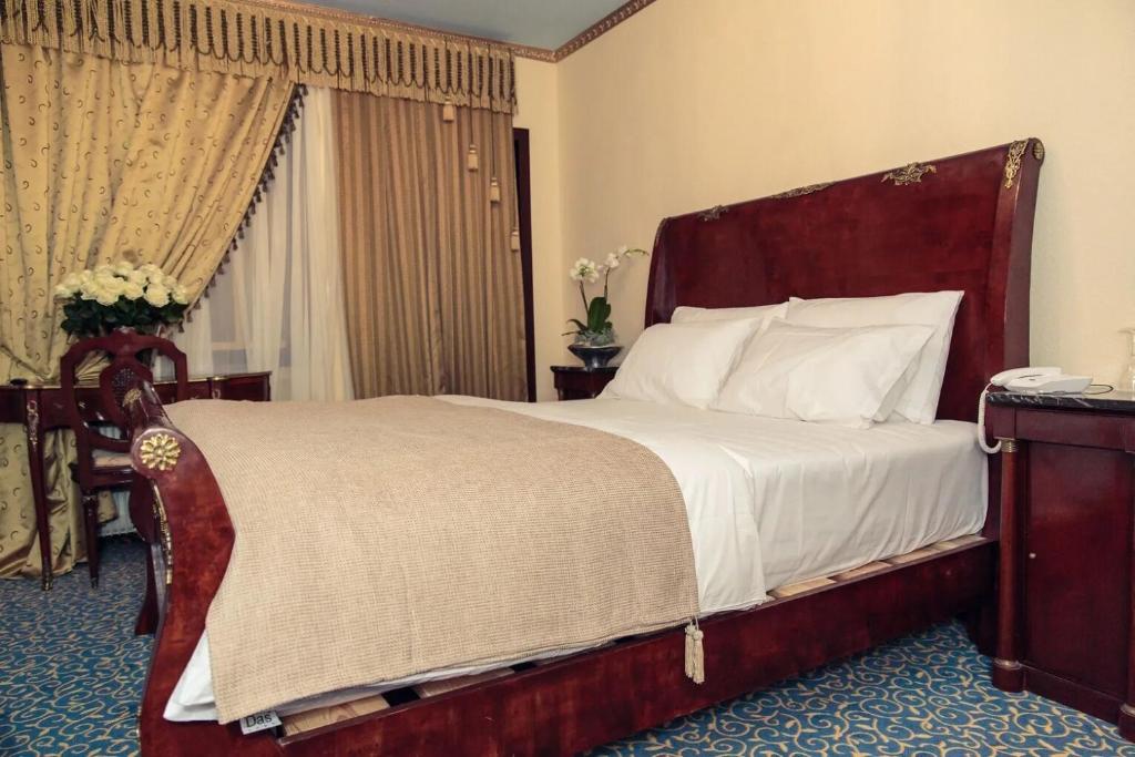 Postel nebo postele na pokoji v ubytování Hotel Stern