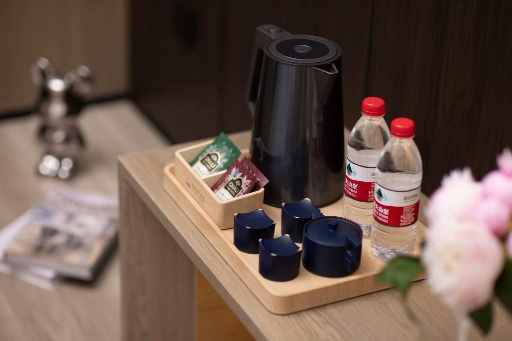 Nápoje v ubytování Wenzhou wumajie all-weather hotel shamao river branch - located in the city center pedestrian street with breakfast coffee afternoon tea free laundry drying service free gym free daily necessities free wifi tourist attractions hotel recommendation