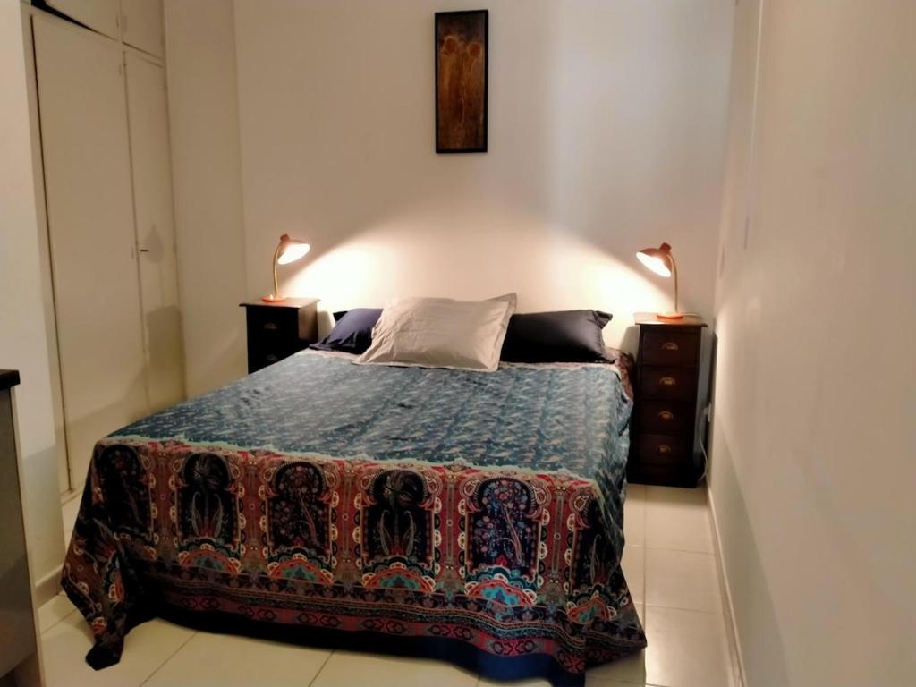 Ένα ή περισσότερα κρεβάτια σε δωμάτιο στο Seteanous Appartement T3 quartier historique