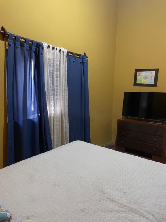 Postel nebo postele na pokoji v ubytování Hostal Alelí