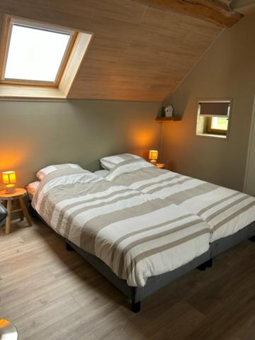Postel nebo postele na pokoji v ubytování B&B Chambres d'Hotes Chez Juredieu
