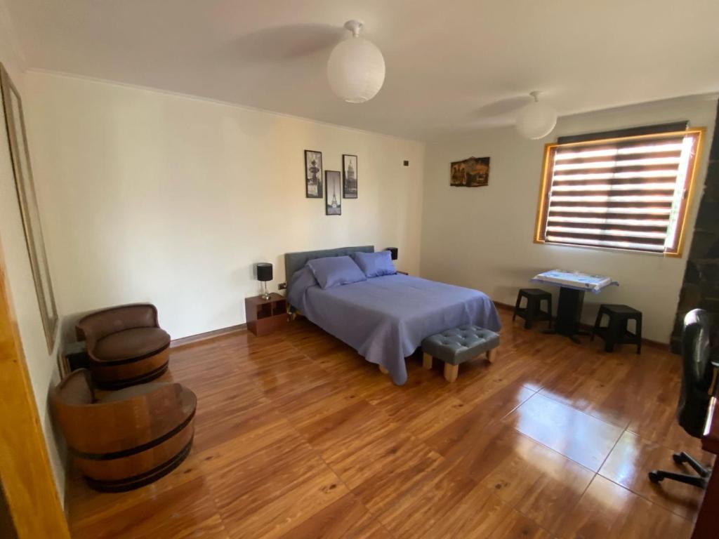 Postel nebo postele na pokoji v ubytování Cabaña hostal
