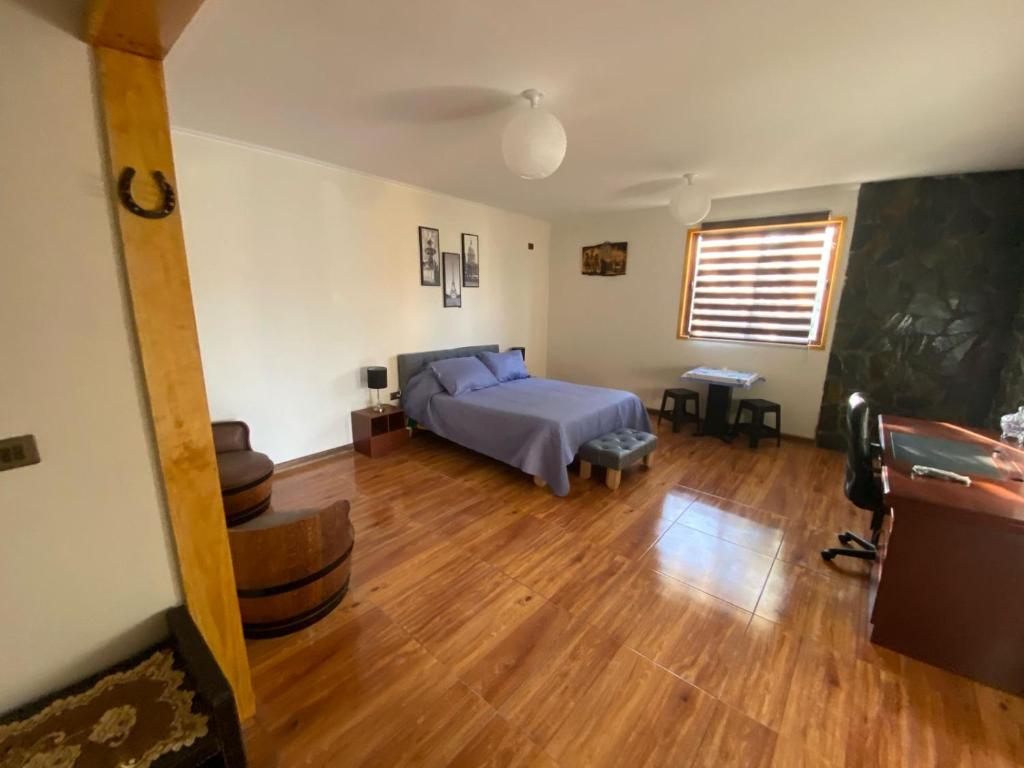 Postel nebo postele na pokoji v ubytování Cabaña hostal