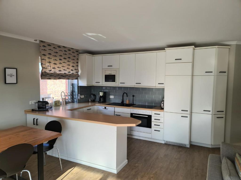 Kuchyň nebo kuchyňský kout v ubytování Loft 22