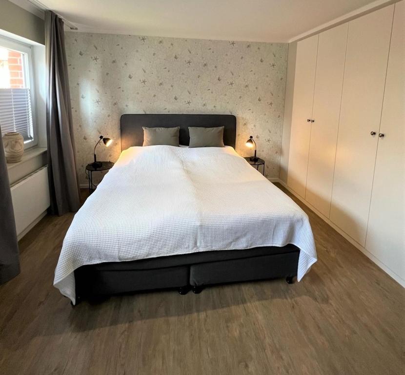 Postel nebo postele na pokoji v ubytování Loft 22