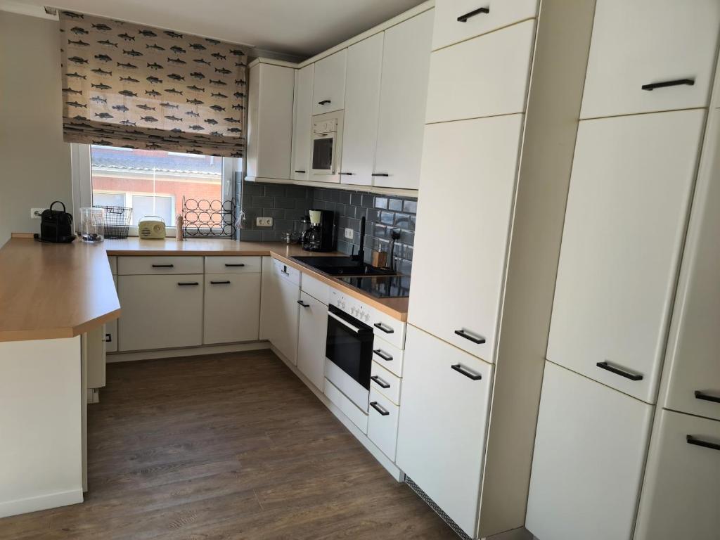 Kuchyň nebo kuchyňský kout v ubytování Loft 22
