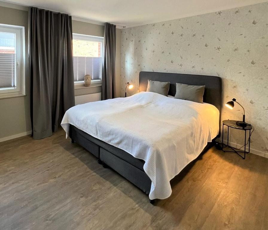 Postel nebo postele na pokoji v ubytování Loft 22
