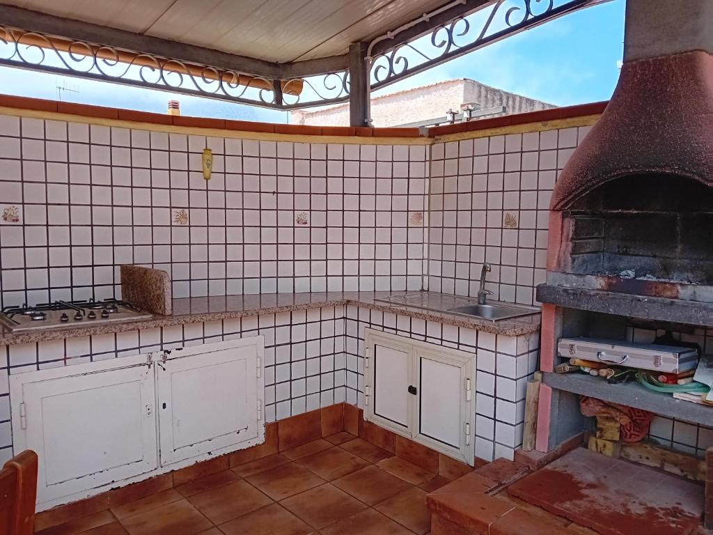 Kuchyň nebo kuchyňský kout v ubytování Villa Rosetta vacanze al mare