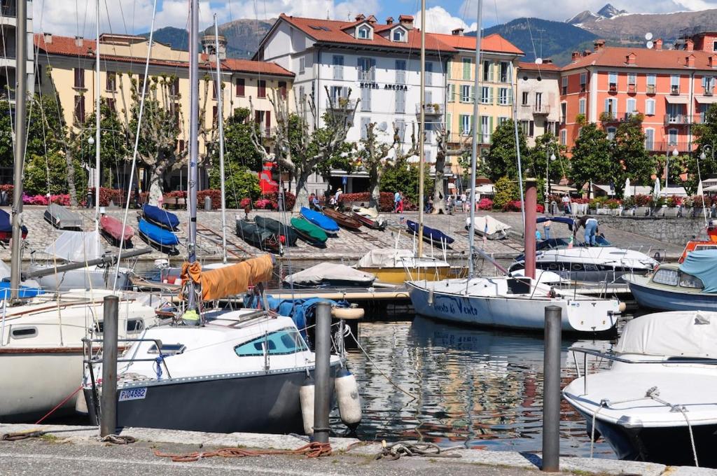 a bunch of boats are docked in a harbor at Lago Maggiore - Verbania - Appartamento Piano Terra - La Casaccia in Verbania