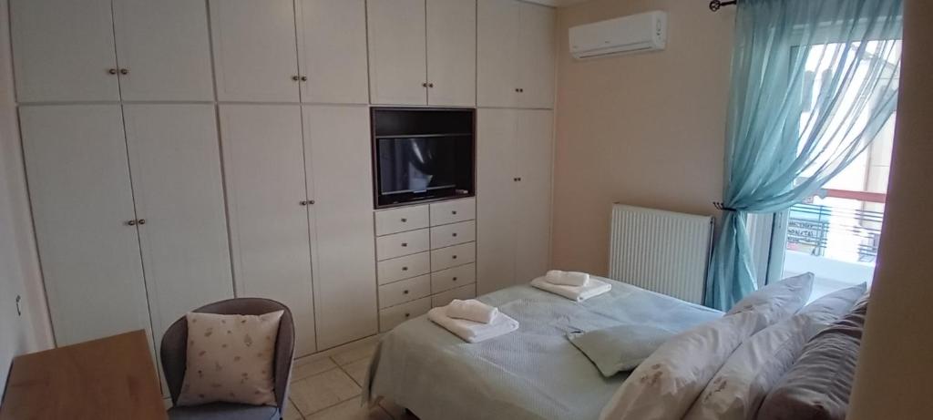Postel nebo postele na pokoji v ubytování Elysian Dreams at Patras