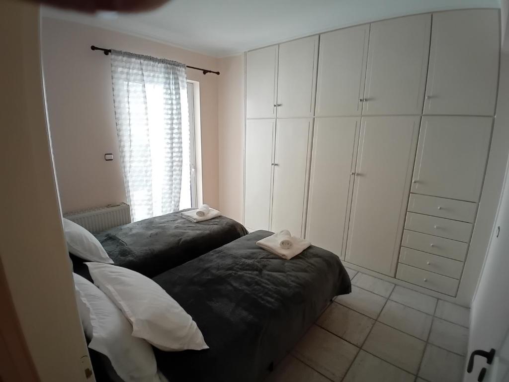 Postel nebo postele na pokoji v ubytování Elysian Dreams at Patras
