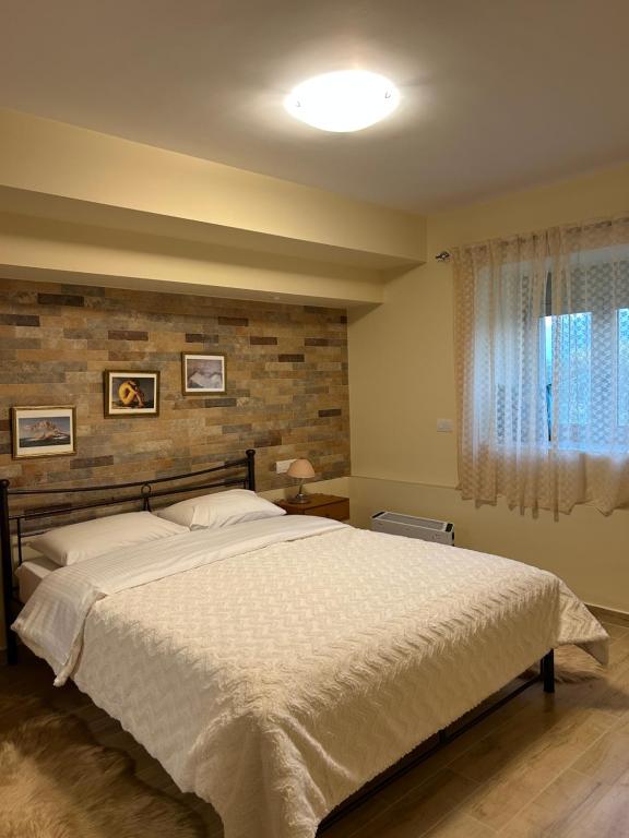 Postel nebo postele na pokoji v ubytování ''Shinohori'' Olive-Tree Apartment