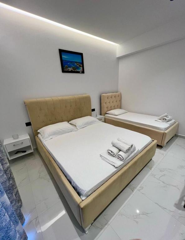 Postel nebo postele na pokoji v ubytování Villa Festim Ksamil