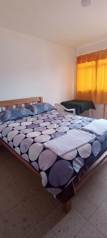 Postel nebo postele na pokoji v ubytování Hacienda Norabuena