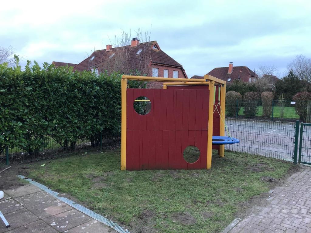 Herní místnost nebo prostor pro děti v ubytování Ferienhaus Hooksiel mit Sauna und Kamin